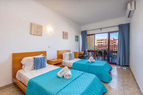 Bed, Living room, Photo of the whole room, Seating area, Bedroom, towels, air conditioner