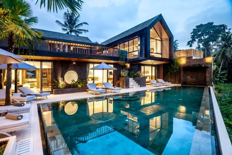 Property building, Facade/entrance, Night, Pool view, Swimming pool, sunbed