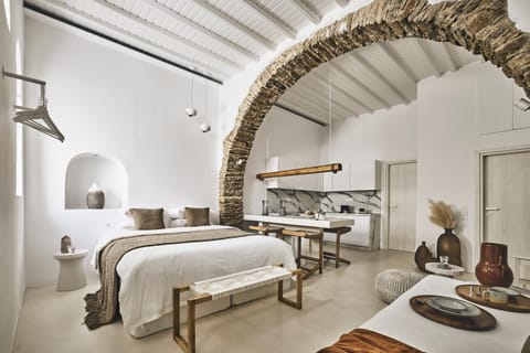 Bed, Living room, Seating area, Bedroom
