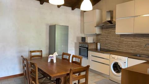 Kitchen or kitchenette, Living room, Seating area, Dining area, oven, stove, washing machine