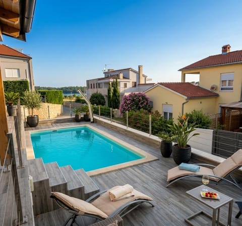 Patio, Pool view, Swimming pool, sunbed