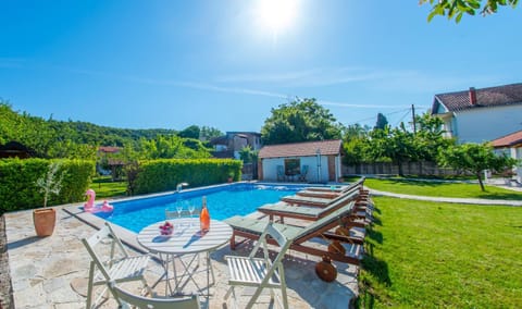Patio, Day, Garden, Pool view, Swimming pool, sunbed