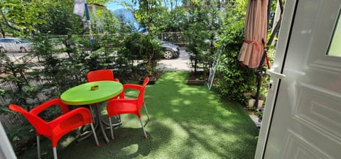 Property building, Patio, Day, Garden, View (from property/room), Balcony/Terrace, Dining area, Garden view