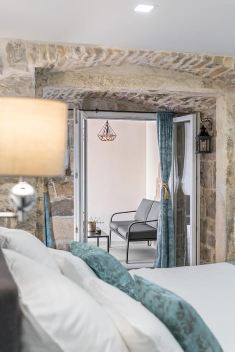 Bed, Seating area, Bedroom