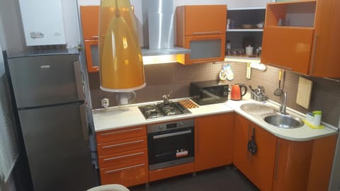 Kitchen or kitchenette, microwave, stove