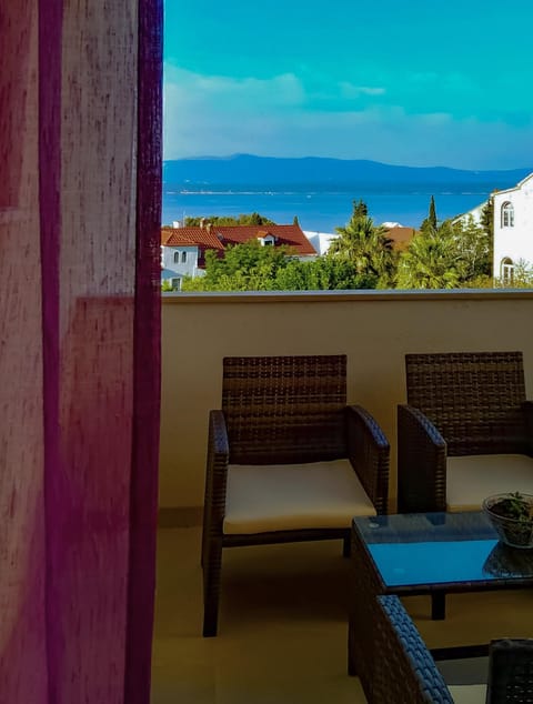 View (from property/room), Balcony/Terrace, Seating area, Sea view