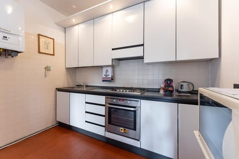 Kitchen or kitchenette, oven, stove, toaster