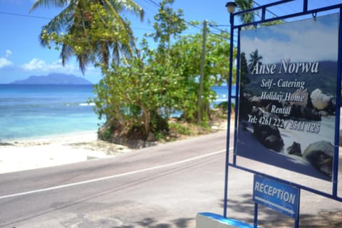 Day, Property logo or sign, Beach