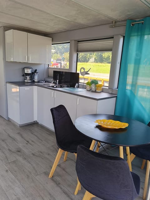 MOONLIGHT HOUSEBOAT Docked boat in Swinoujscie