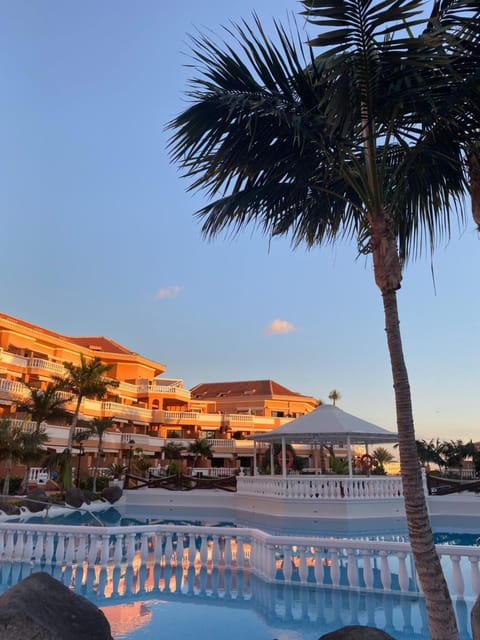Property building, Swimming pool, Sunset