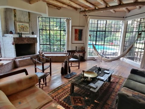 Living room, Seating area, Pool view