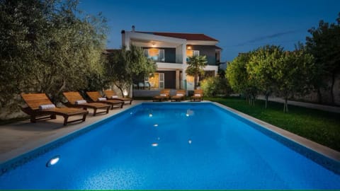 Property building, Patio, Night, Garden, Pool view, Swimming pool, sunbed