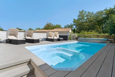 Property building, Living room, Swimming pool