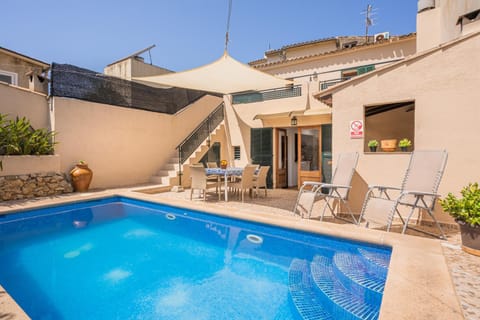 Property building, Living room, Swimming pool