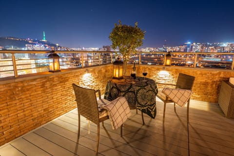 Restaurant/places to eat, Night, View (from property/room), Evening entertainment, City view, Landmark view, Mountain view, Street view, Dinner, Drinks