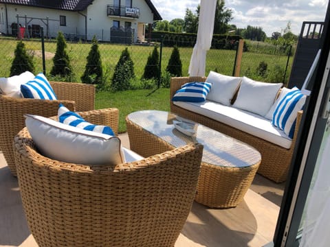 Domek z jacuzzi Summer House Dziwnówek Wrzosowo House in West Pomeranian Voivodeship, Poland