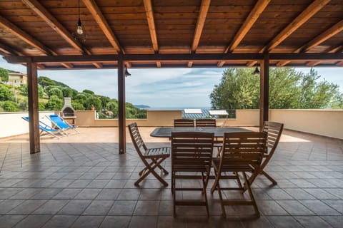 Property building, Natural landscape, BBQ facilities, View (from property/room), View (from property/room), Balcony/Terrace, Dining area, Mountain view, Sea view, Sea view