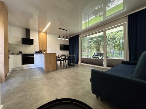 Apartamenty w sam las by KLIF Ustka - apartament na parterze z tarasem i parkingiem Apartment in Pomeranian Voivodeship