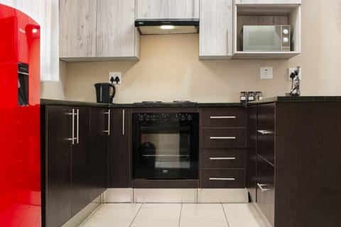 Kitchen or kitchenette, stove, kitchen