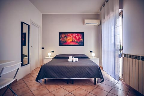 Bed, Photo of the whole room, Bedroom, towels, air conditioner