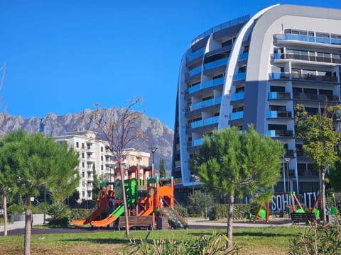 Property building, Day, Children play ground, Mountain view