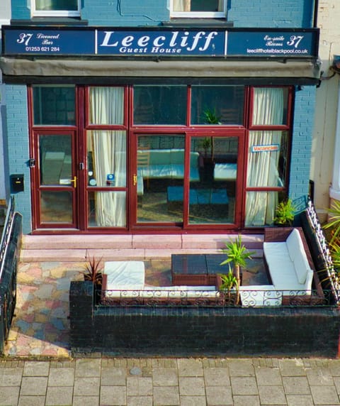 Property building, Patio, Facade/entrance, Day, Seating area
