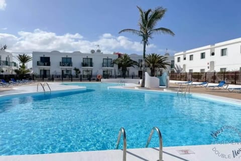 Property building, Pool view, Swimming pool, sunbed