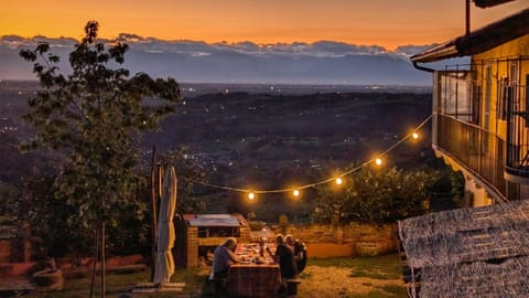 Property building, Patio, Natural landscape, BBQ facilities, View (from property/room), Dining area, Evening entertainment, City view, Garden view, Mountain view, group of guests, Inner courtyard view