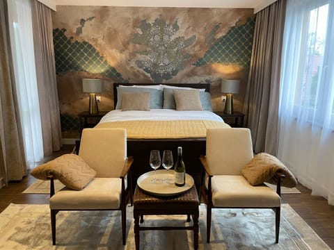 Bed, Living room, Seating area, Bedroom