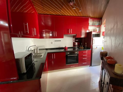 Kitchen or kitchenette, oven, stove, toaster