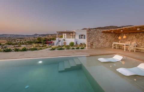 Property building, Patio, Natural landscape, Mountain view, Pool view, Swimming pool