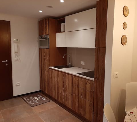 Kitchen or kitchenette, oven, stove