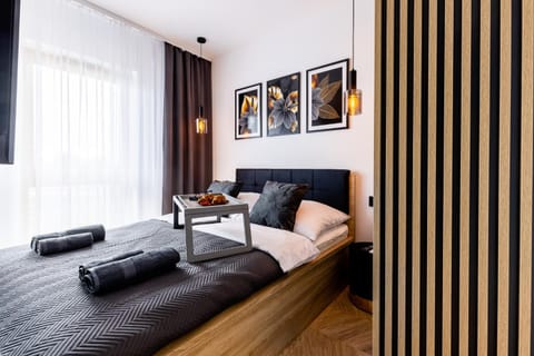 Bed, Seating area, Bedroom