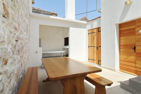 Stone house in the center of Murter town Villa in Murter