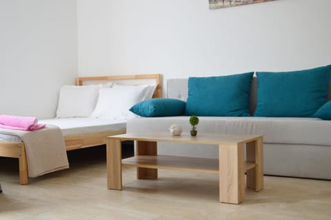 Bed, Living room, Seating area