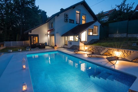 Property building, Patio, Night, Garden, Balcony/Terrace, Garden view, Pool view, Swimming pool, sunbed