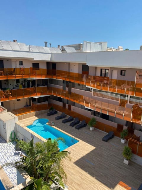 Property building, View (from property/room), Balcony/Terrace, Pool view, Swimming pool, sunbed