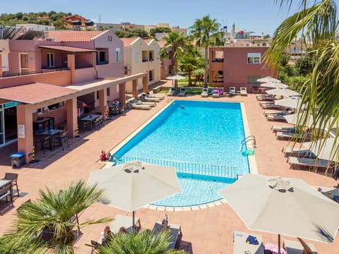 Property building, Day, Pool view, Swimming pool, sunbed