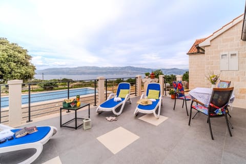 Balcony/Terrace, Seating area, Dining area, Pool view, Sea view, Swimming pool