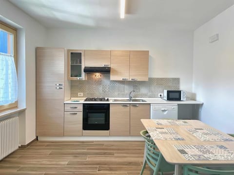 Kitchen or kitchenette, oven, stove