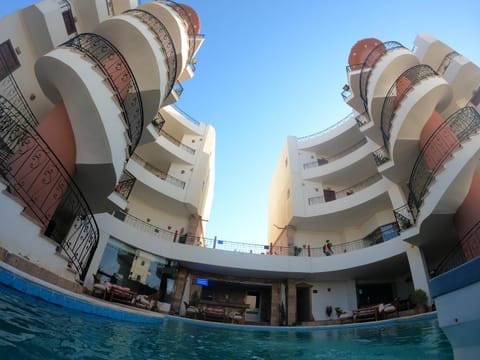 Property building, Restaurant/places to eat, Swimming pool