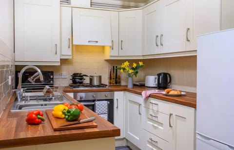 Kitchen or kitchenette, oven, stove, toaster