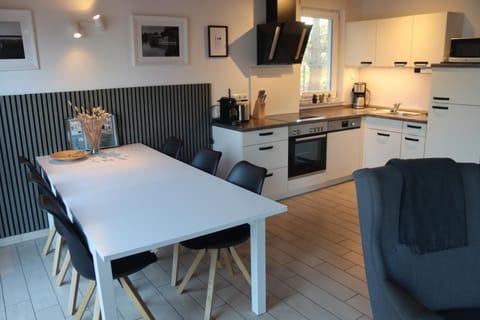 Kitchen or kitchenette, Seating area, Dining area, dishwasher, oven, stove, toaster