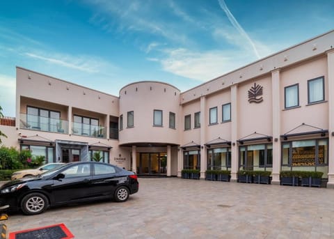 Property building, Day, Location, Parking