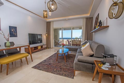 TV and multimedia, View (from property/room), Living room, Seating area, Sea view