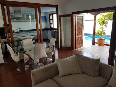 Living room, Dining area, Pool view