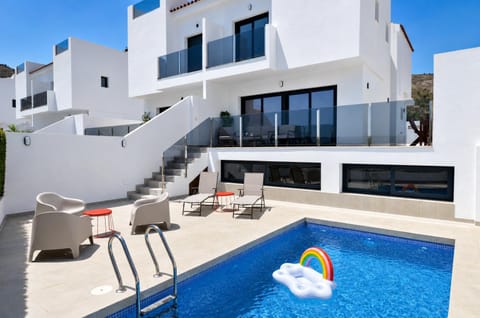 Property building, Balcony/Terrace, Seating area, Swimming pool, sunbed