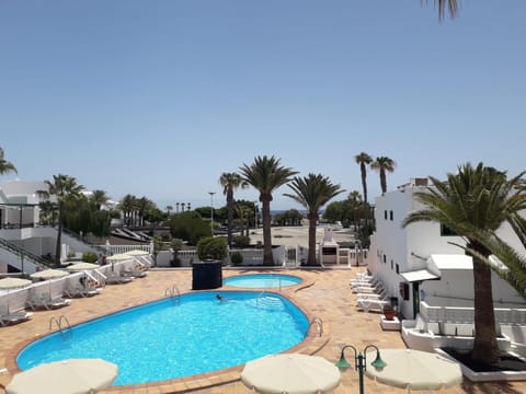 View (from property/room), Pool view, Sea view, Swimming pool
