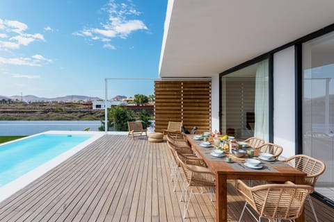 Balcony/Terrace, Seating area, Pool view, Swimming pool