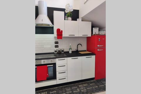 Kitchen or kitchenette, oven, stove